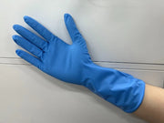 Close-up of diamond textured palm on blue nitrile glove for enhanced grip